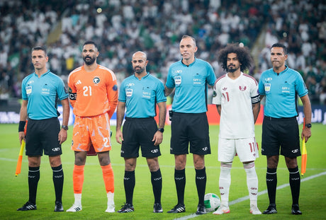Khaleeji 27 referees in Al Nasser kits with the team captains