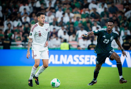 Khaleeji 27 match action in front of the Al Nasser advertising board