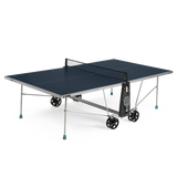 Tennis table with a dark blue playing surface, silver metal frame, and four wheels